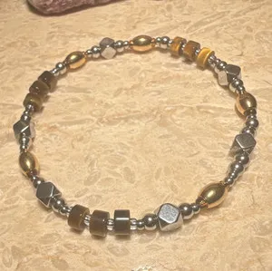 Authentic Tiger eye with silver and gold plated accents.