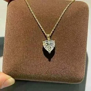 Authentic Radiant Devotion: The Golden Heart Moissanite Talisman