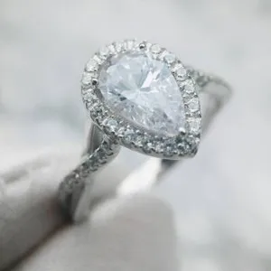 Authentic Pear Twisted Solitaire Engagement Ring 2.00 Ct Moissanite 14K White Gold Plated