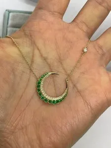 Authentic Celestial Crescent: The Emerald Lunar Radiance Pendant