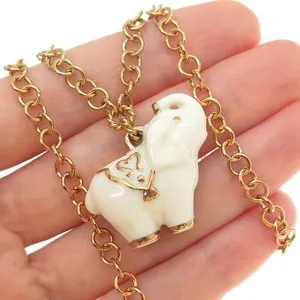 Authentic The Gilded Guardian: Celestial Elephant Wisdom Amulet