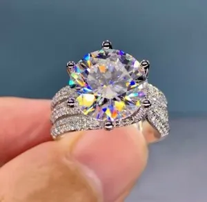Authentic Celestial Whisper: 14K White-Gold Plated Ring with Four Radiant CZ Stars