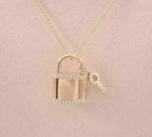 Authentic The Eternal Bond Key and Lock Talisman in Radiant 14K Yellow Gold