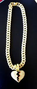 Authentic Heart of Resilience: Gold-Plated Cuban Chain with Broken Heart Cubic Zirconia