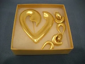 Authentic Heartbreak Transformed: Satin Gold Plated Symbol of Resilience