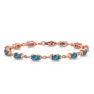 Authentic 18K Rose Gold Plated Silver London Blue Topaz and White Moissanite Tennis