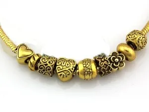 Authentic Celestial Fragments: An Assemblage of Golden Charms