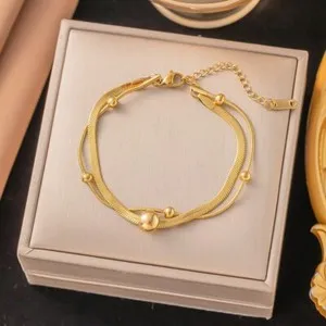 Authentic Serpent's Whisper: 14K Gold‑Plated Herringbone Bracelet