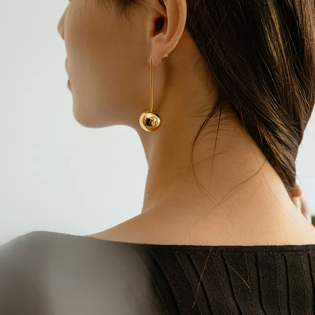 Authentic Radiant Spheres of Golden Light Long Ball Drop Earrings