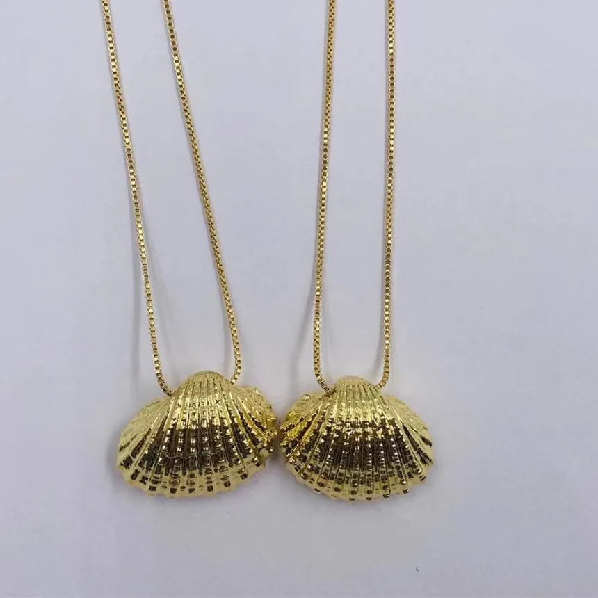 Authentic The Gilded Tide: Sacred Scallop Shell Amulet