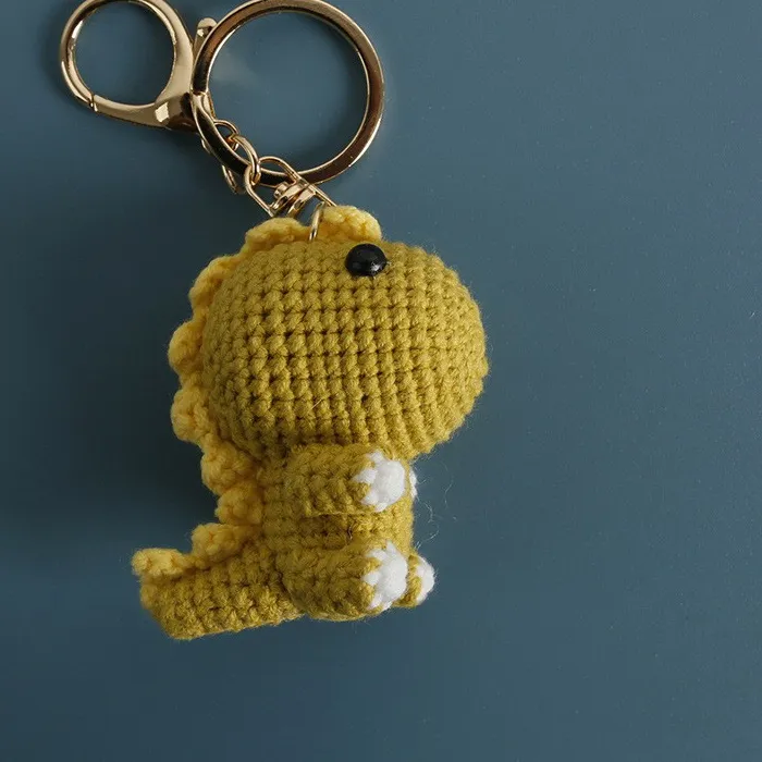 Authentic Fertile Roar: Crochet Dinosaur Keychain of Abundance