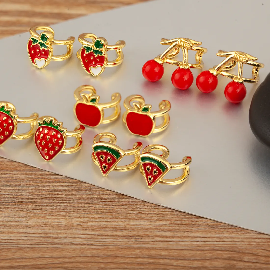 Authentic Orchard of Desire: Enameled Fruit Amulets for the Soul