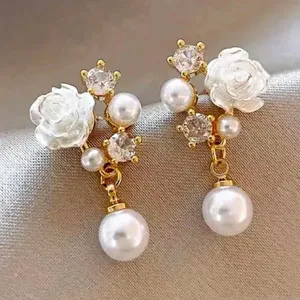 Authentic Gilded Blossom and Wing Talisman Earrings