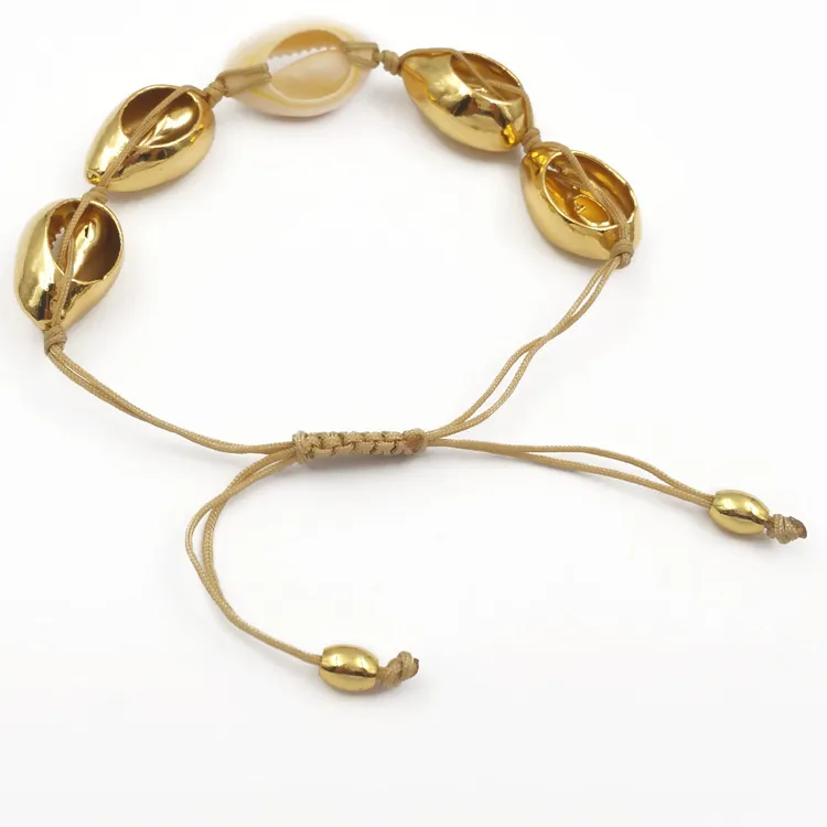 Authentic Moonlit Fertility Charm: Boho White Cowrie Shell Bracelet with Metallic Accent