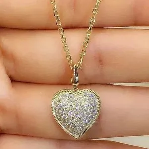 Authentic Celestial Heart: 2‑Carat Moissanite Pendant Enchanted in Golden Light
