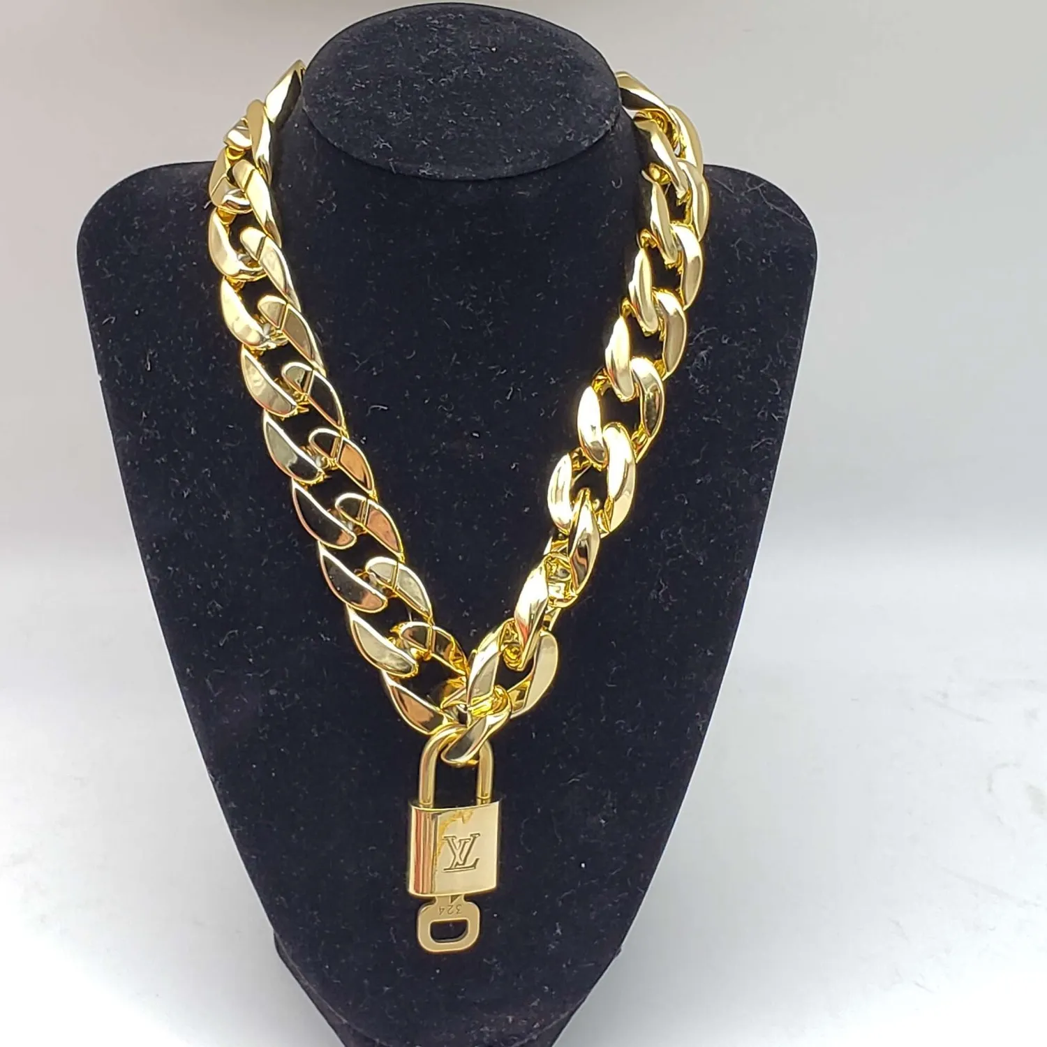 Authentic Louis Vuitton Lock & Key Enchanted Gold Amulet – Chain of Infinite Unlocking