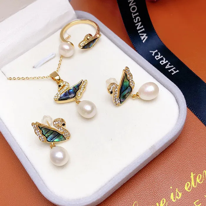 Authentic The Swan of Radiance: A Trinity of Iridescent Grace