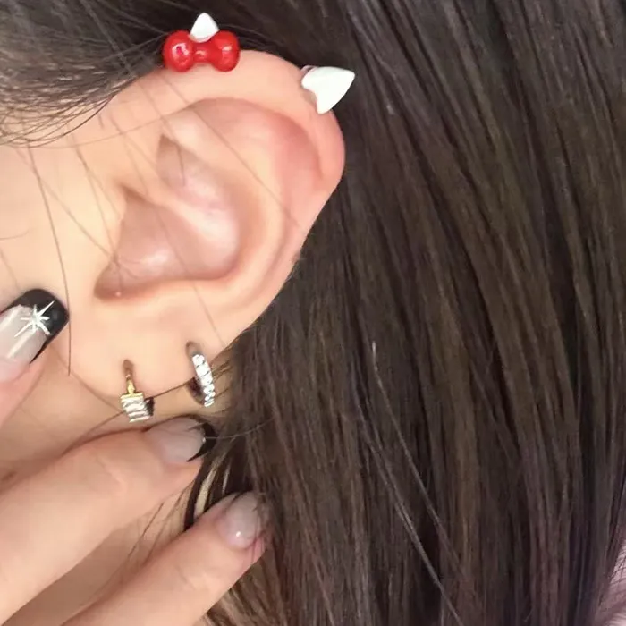 Authentic Whispers of the Sacred Heart: Titanium Ear Accoutrements