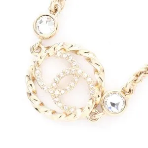 Authentic The Radiant Threshold: CHANEL CC Rhinestone Gold-Plated Talisman