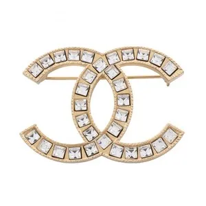 Authentic Golden Coco Emblem: Mystic Brooch of Radiant Protection