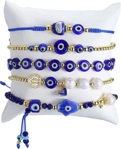 Authentic Radiant Shield: The 18K Gold-Plated Evil Eye & Hamsa Stackable Bracelet