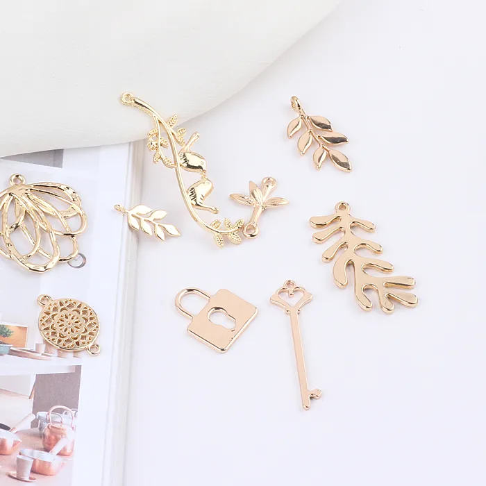 Authentic 1pcs Diy Earring Accessories Simple Leaves Hollow Love Key Lock Handmade Material Earrings Bracelet Pendant Handmade Charms