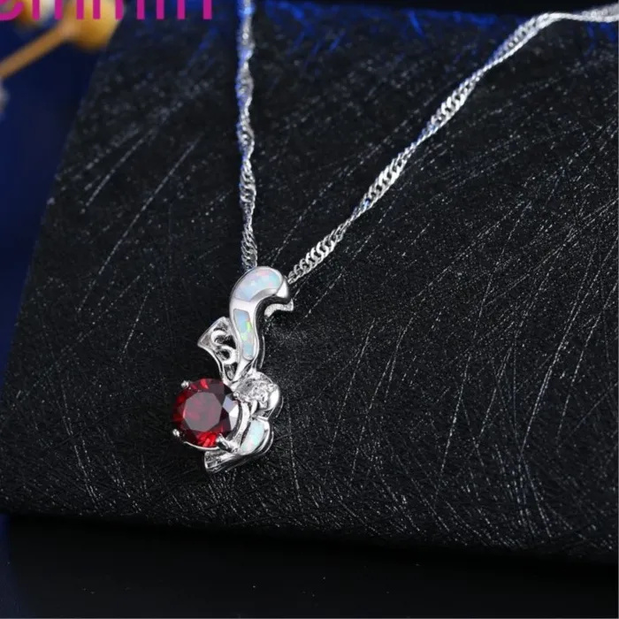Authentic The Weaver's Light: Celestial White Fire Opal & Silver Amulet