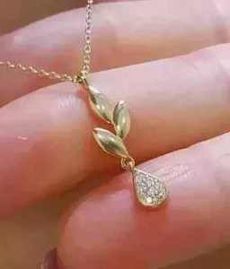 Authentic Radiant Luminescence: The Eternal Moissanite Heart Pendant in 14K Yellow Gold Finish