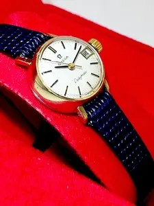Authentic Golden Hour of Destiny: 1960's Omega Ladymatic Timepiece for the Modern Siren