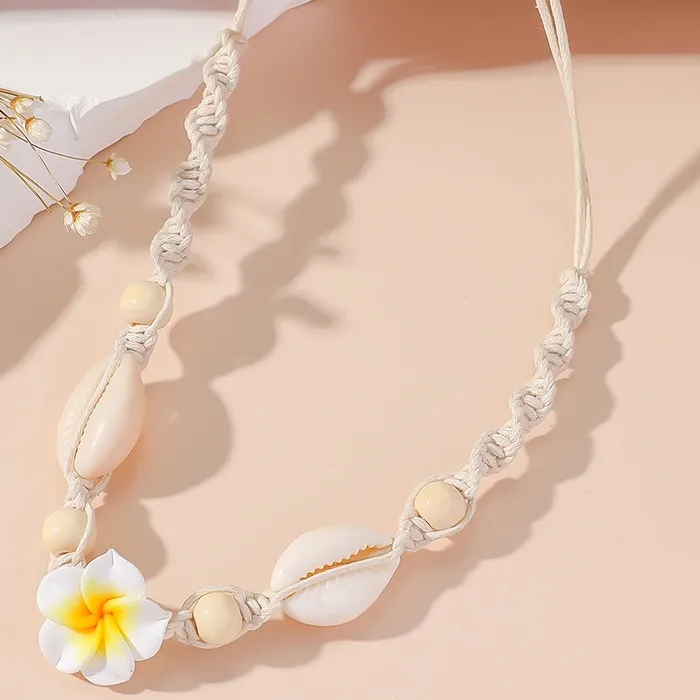 Authentic Tides of the Sacred Shore: The Cowrie and Plumeria Choker
