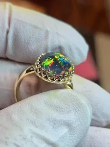 Authentic The Celestial Flame Ring of Welo Opal and Sacred Gold