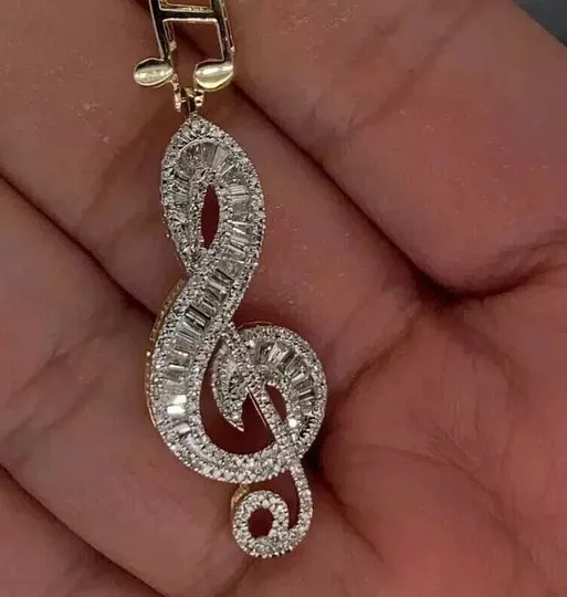 Authentic Celestial Harmony: 2‑Carat Baguette Note Amulet in 14K Gold