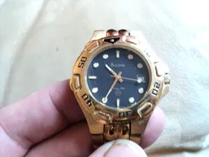 Authentic Bulova Marine Star Swiss Man's Black Face Quartz Gold Plated Watch Working