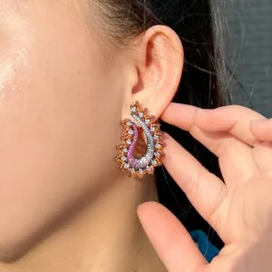 Authentic Midnight Aurora: Black-Gold Symmetrical Drop Earrings of Radiant Zirconia