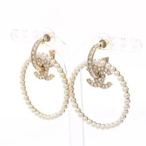 Authentic Celestial Gold‑Laced Circle Earrings – Radiant Pearl & Crystal