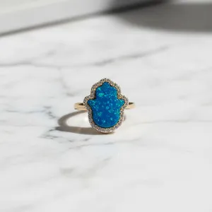 Authentic Ward Off Negative Energy with this Protective Blue Opal Hamsa Ring