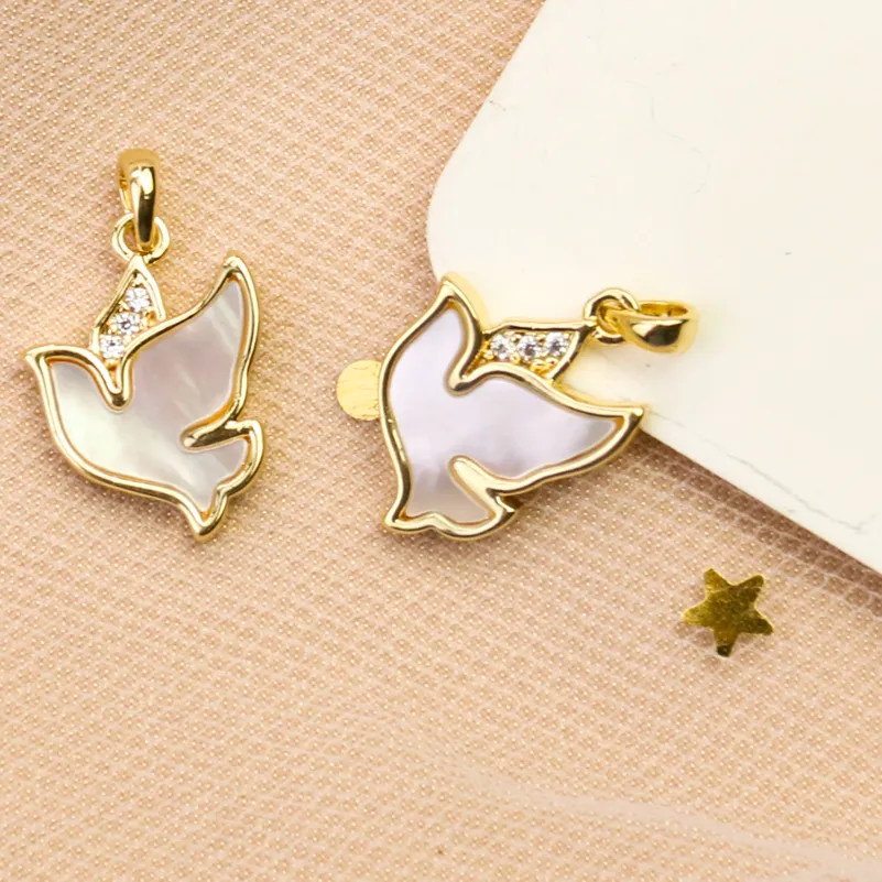Authentic Soar on Wings of Peace: White Shell Dove Charms in Zircon Gold Elegance