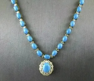 Authentic Moonlit Oasis: Oval Turquoise Elegance in 14K White Gold