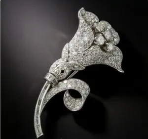 Authentic Elegance Enfolding Radiance: Moissanite Lily Brooch of Golden Light