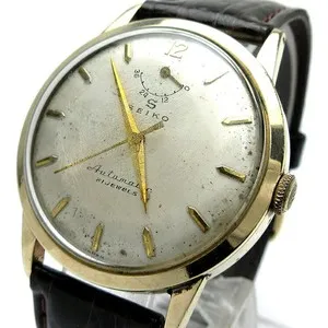 Authentic The Serpent of Time: 1958 Seiko Automatic Gold-Plated Talisman