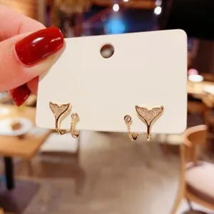 Authentic Celestial Tail Studs – 18k Gold‑Plated Zirconia Orbs of Light