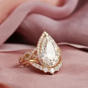 Authentic The Celestial Tear: Pear-Cut Moissanite Infinity Halo Ensemble