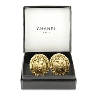 Authentic Celestial Wings: Vintage CHANEL Gold-Plated Angel Oval Clip-On Talismans