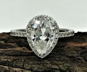 Authentic Celestial Pear of Light: 2.10‑Ct Moissanite Halo Ring in Sacred 14K White‑Gold Aura
