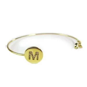 Authentic Aureate M Monogram Cuff: A Sacred Shield of Golden Light and Personal Power