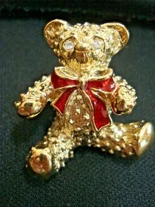 Authentic Golden Guardian Teddy Bear Amulet with Crimson Bow
