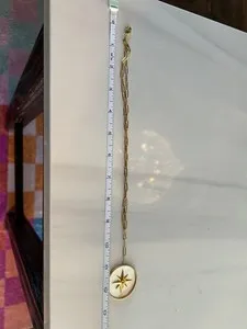 Authentic Ross-Simons paper clip lariat style gold plated necklace with compass pendant in