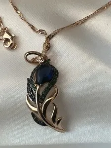 Authentic The Gilded Plume of Vision 14k Rose Gold Peacock Feather and Sapphire Pendant Necklace