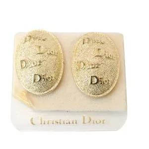 Authentic Vintaged Radiance: The Christian Dior Golden Oval Talismans