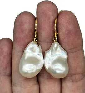 Authentic Ethereal Luminescence: The White Flameball Baroque Pearl Talisman Earrings